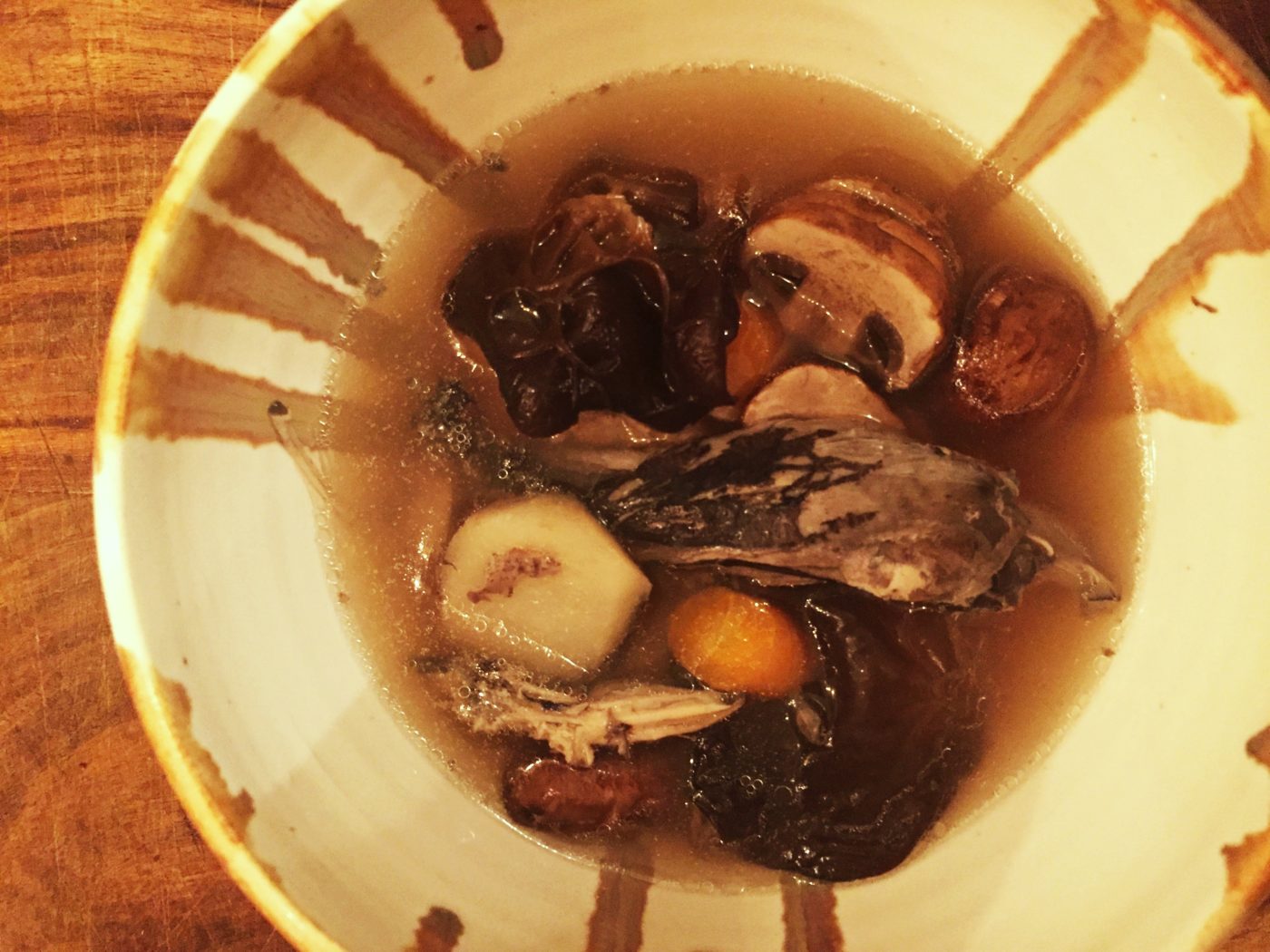 Bowl of medicinal black chicken soup