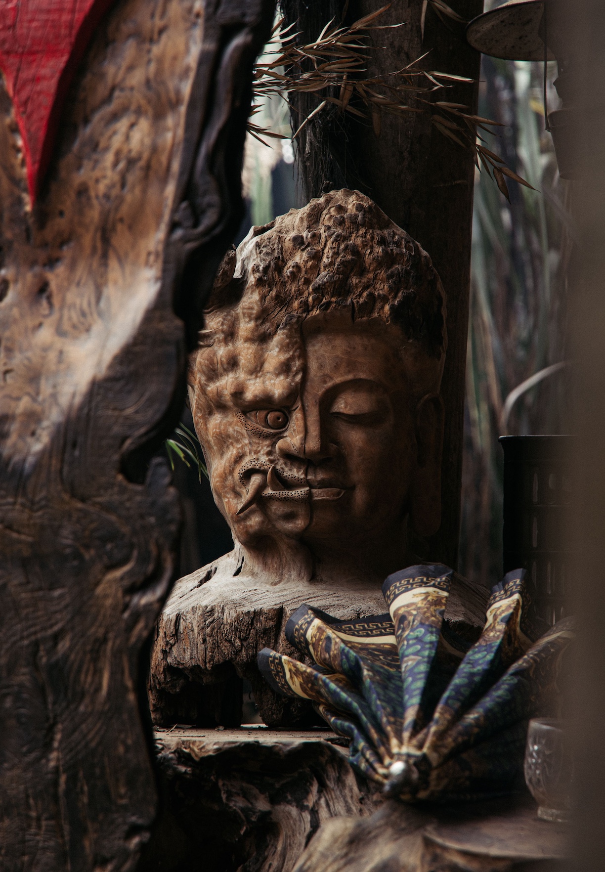 two faced wooden sculpture